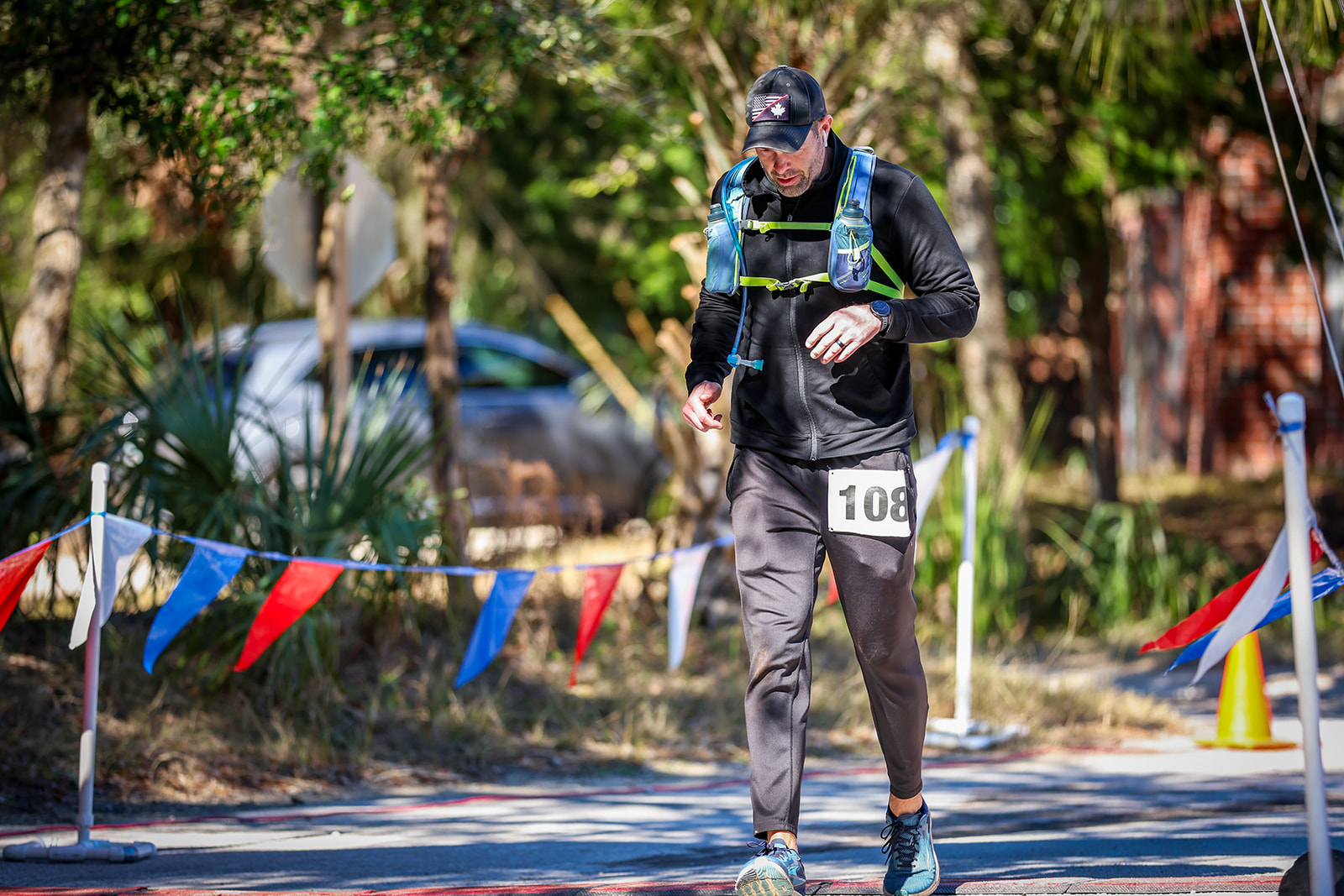 Woman smiling in teal outfit near fort